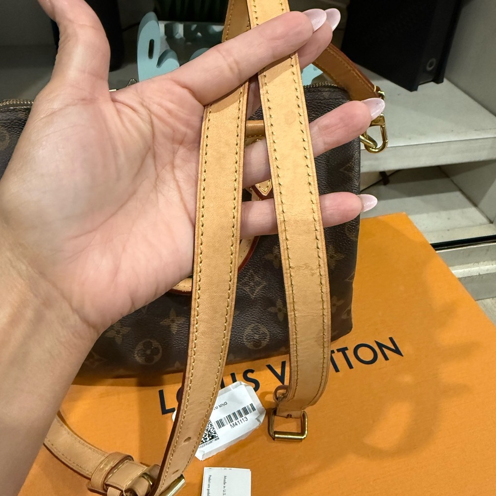 Louis Vuitton - Picture 12 of 14